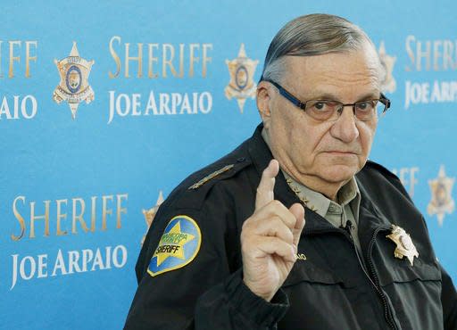 FILE - In this Dec. 18, 2013, file photo, Maricopa County Sheriff Joe Arpaio speaks at a news conference at the Sheriff's headquarters in Phoenix, Ariz. Embattled Maricopa County Sheriff Joe Arpaio is seeking a seventh term and faces former Buckeye Police Chief Dan Saban and two other challengers. The election comes less than two weeks after a federal judge recommended criminal contempt-of-court charges against the 84-year-old lawman of metropolitan Phoenix for ignoring an order to halt his signature anti-immigration patrols. (AP Photo/Ross D. Franklin, File)