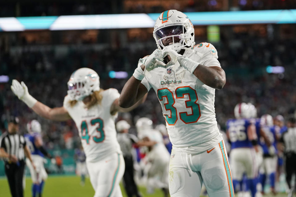 Miami Dolphins cornerback Eli Apple (33) celebrates after intercepting a pass in the end zone during the first half of an NFL football game against the Buffalo Bills, Sunday, Jan. 7, 2024, in Miami Gardens, Fla. (AP Photo/Lynne Sladky)