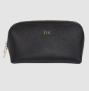 <p>You need something to carry all those products in, why not also have it personalised? <a rel="nofollow noopener" href="https://www.thedailyedited.com/large-black-cosmetic-case" target="_blank" data-ylk="slk:The Daily Edited, $119.95;elm:context_link;itc:0;sec:content-canvas" class="link ">The Daily Edited, $119.95</a> </p>