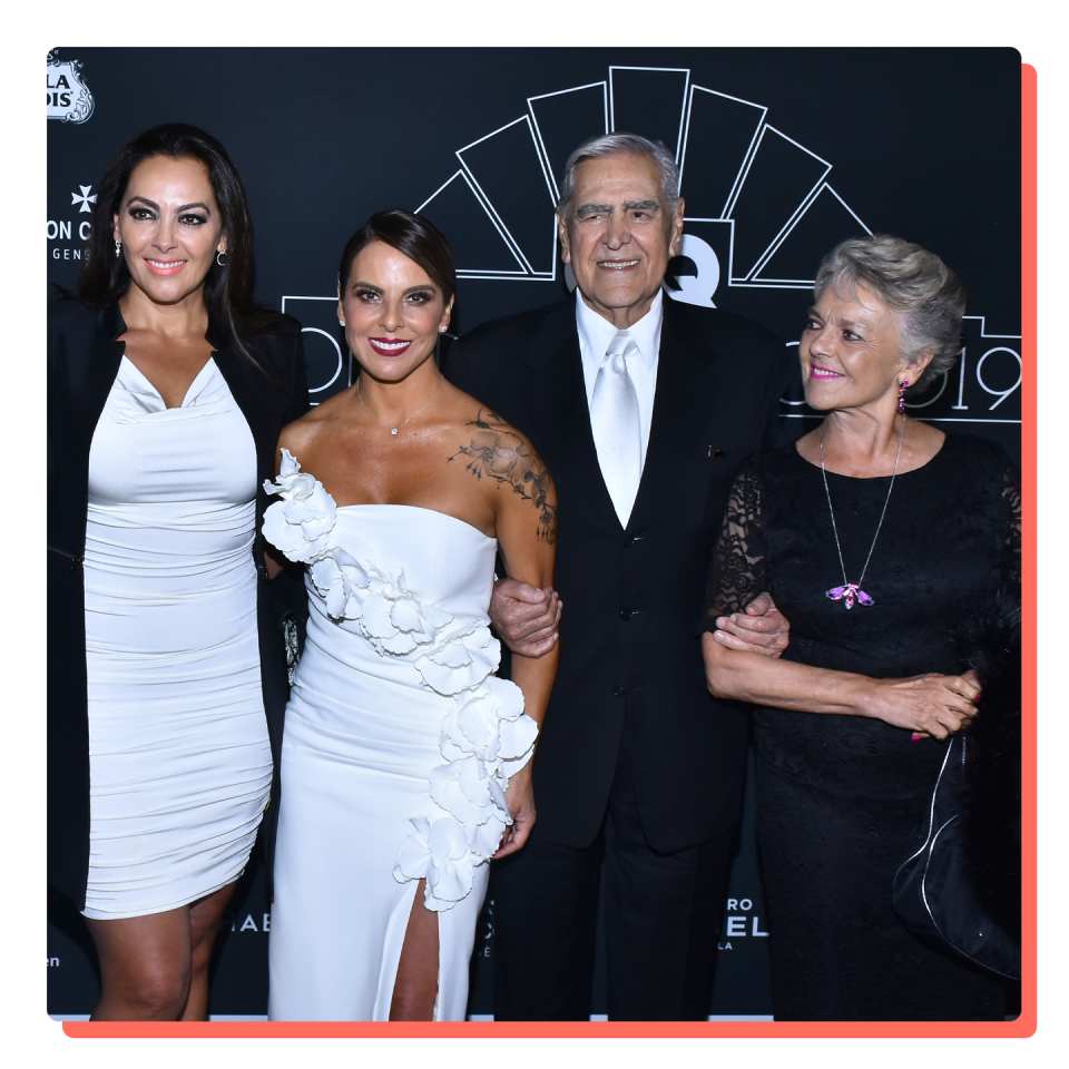 kate del castillo and family posing on red carpet