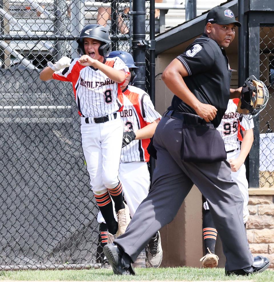 Middleboro 12U Nationals celebrate Gavin Gillpatrick game winning home run in the top of the sixth inning during a game versus Concord, New Hampshire at the Bartlett Giamatti Little League Leadership Training Center in Bristol, Connecticut for the New England Regional tournament on Saturday, August  6, 2022.