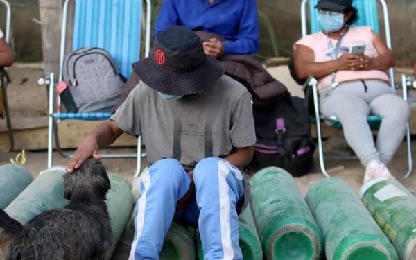 Long queues to refill oxygen tanks continue in Lima as the country battles a second wave of coronavirus infections - Raul Sifuentes /Getty