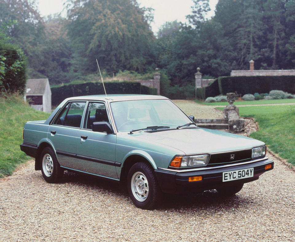 A Honda car on a gravel road