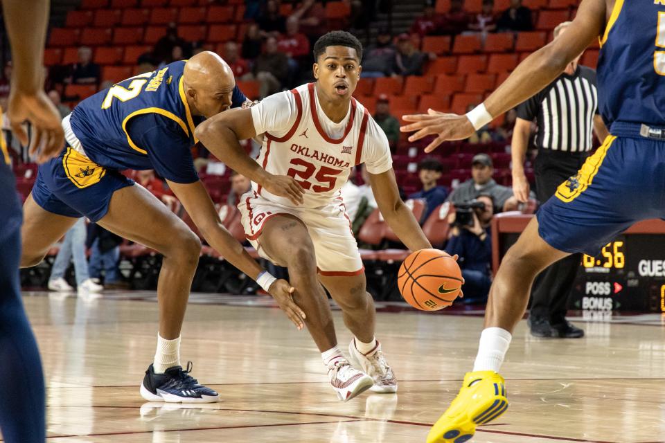 Oklahoma guard Grant Sherfield (25) drives to the basket in the second half of a 75-53 win against UMKC on Tuesday at Lloyd Noble Center in Norman.