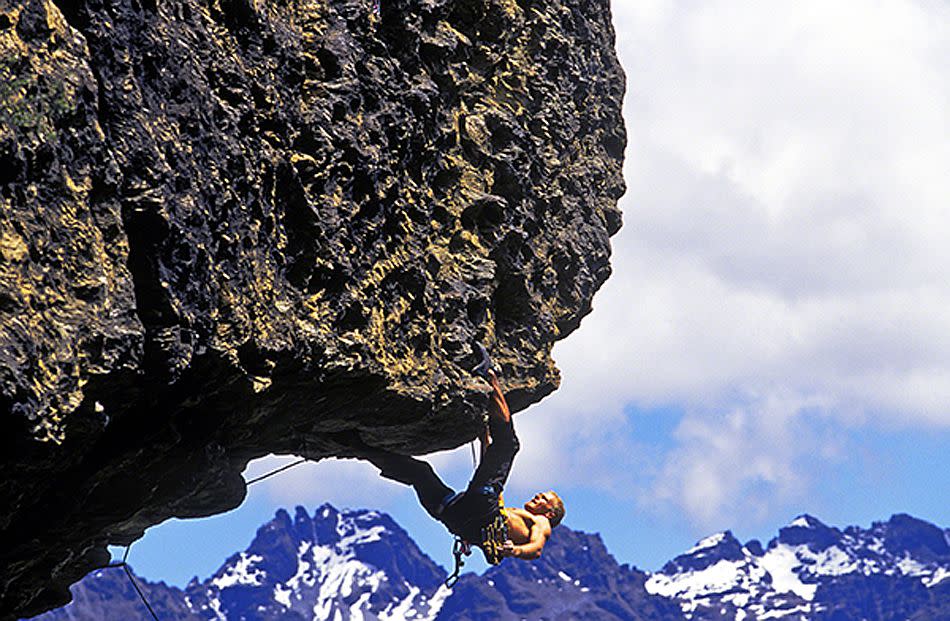 Wye Creek, Queenstown, New Zealand. <br><br>A rock climber attacks a difficult overhang. <br><br>Camera: Canon EOS1V Fuji Velvia 50 ISO film. <br><br>Chris McLennan, New Zealand <br><br>Highly Commended, Spirit of Adventure portfolio