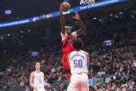 Toronto Raptors' Pascal Siakam shoots over Oklahoma City Thunder's Jeremiah Robinson-Earl during the first half of an NBA basketball game Wednesday, Dec. 8, 2021, in Toronto. (Chris Young/The Canadian Press via AP)