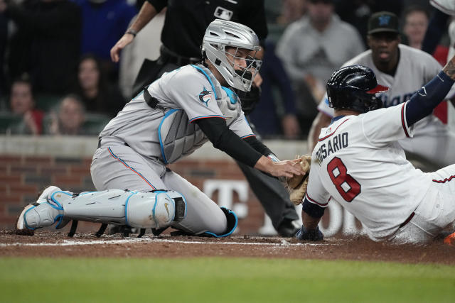 Grissom drives in go-ahead run as Braves rally past Marlins