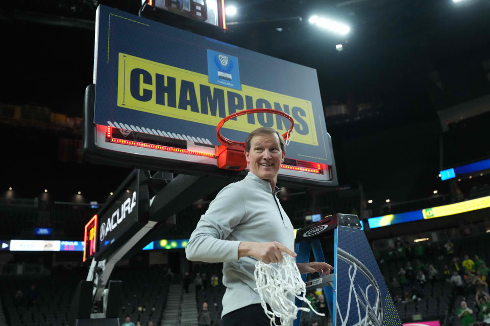 Oregon Ducks head coach Dana Altman cuts down the net after the Pac-12 Championship game against the Colorado Buffaloes at T-Mobile Arena March 16, 2024, in Las Vegas.