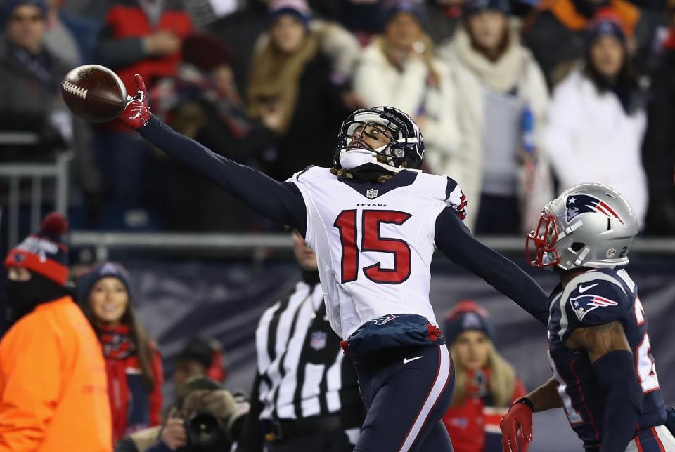 <p>Will Fuller V #15 of the Houston Texans reaches for a ball in the first half against the New England Patriots during the AFC Divisional Playoff Game at Gillette Stadium on January 14, 2017 in Foxboro, Massachusetts. (Photo by Elsa/Getty Images) </p>