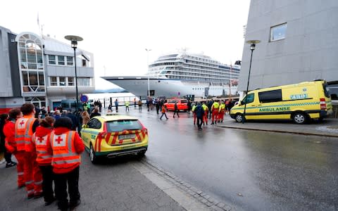 The cruise ship Viking Sky, that ran into trouble in stormy seas off Norway, reaches the port of Molde under its own steam - Credit: Svein Ove Ekornesvaag/AFP