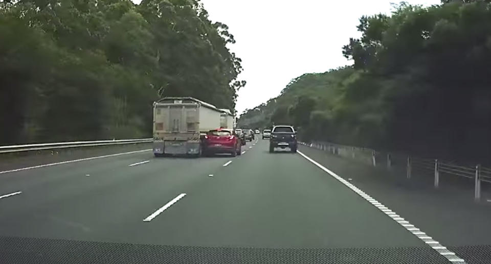 The car is then side-swiped by the truck before it drives off. Source: Facebook/ Dash Cam Owners Australia