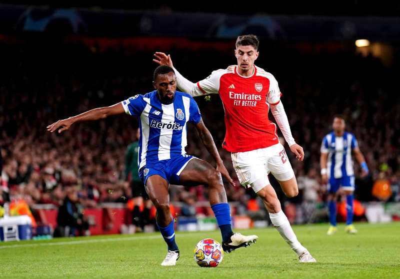 FC Porto's Otavio and Arsenal's Kai Havertz battle for the ball during the UEFA Champions League Round of 16, second leg soccer match between Arsenal and FC Porto at the Emirates Stadium. Zac Goodwin/PA Wire/dpa