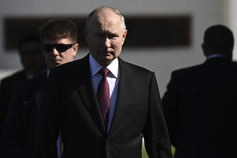 FILE - Russian President Vladimir Putin, center, walks to attend a welcome ceremony with Kyrgyzstan President Sadyr Japarov at talks in Bishkek, Kyrgyzstan, on Thursday, Oct. 12, 2023. It's not just opposition politicians who are targeted under Putin in recent years but also independent voices who don't conform to what the state sees as Russia's "traditional values." (Pavel Bednyakov, Sputnik, Kremlin Pool Photo via AP, File)