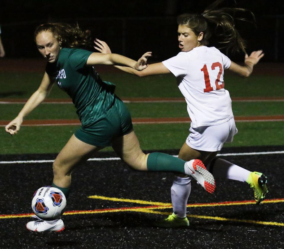 Northern Highlands vs Ramapo -- Girls Soccer -- Ramapo's   Megan Twomey goes for the ball in front of Carolyn Weinberger of Northern Highlands.