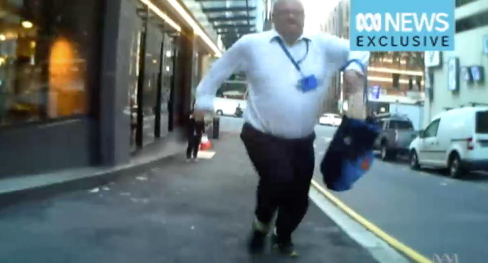 The pedestrian (pictured) charging at the cyclist in a footpath rage attack