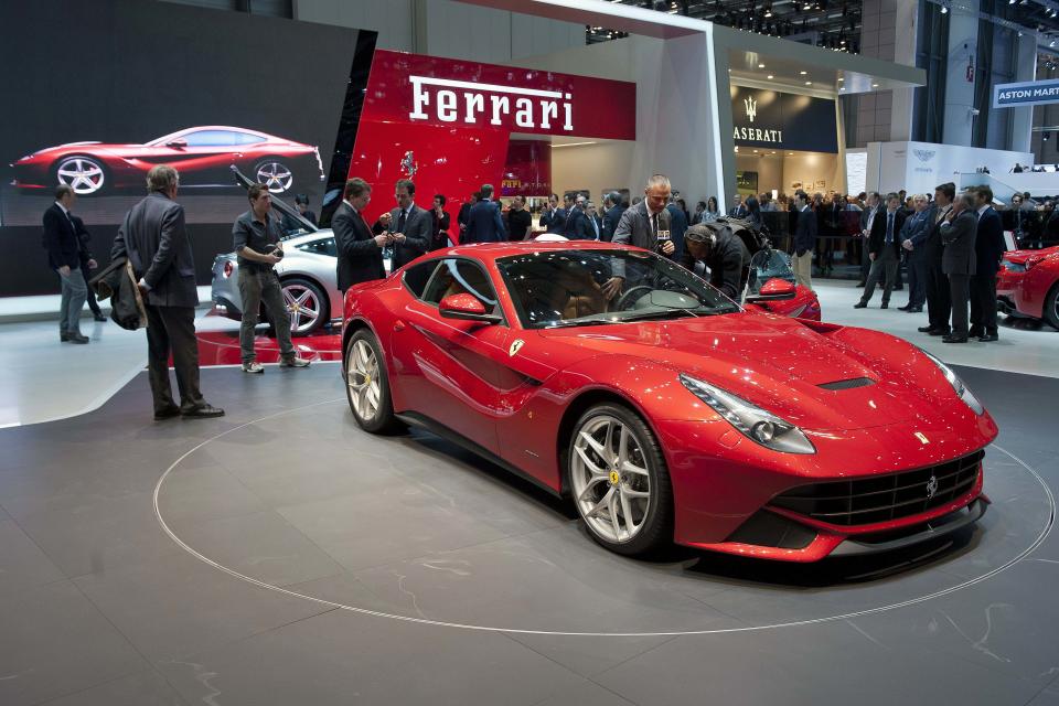 The New Ferrari F12 Berlinetta is shown during the press day at the Geneva International Motor Show in Geneva, Switzerland, Tuesday, March 6, 2012. The Motor Show will open its gates to the public from March 8 to 18, presenting more than 260 exhibitors and more than 180 world and European premieres. (AP Photo/Keystone, Sandro Campardo)