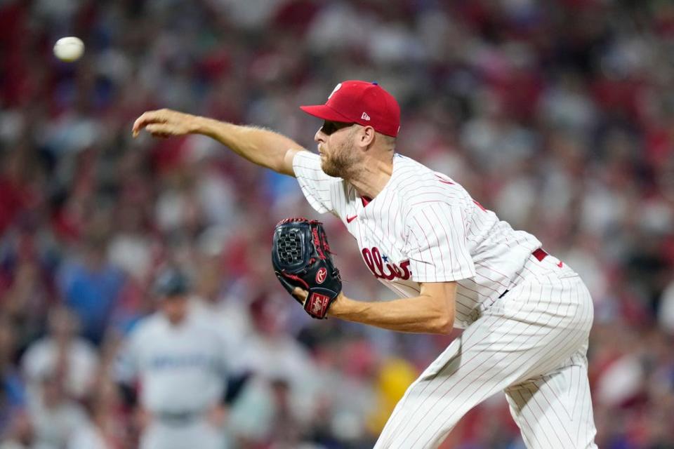 Philadelphia Phillies' Zack Wheeler pitches during the third inning of Game 1 in an NL wild-card baseball playoff series against the Miami Marlins, Tuesday, Oct. 3, 2023, in Philadelphia. (AP Photo/Matt Slocum)