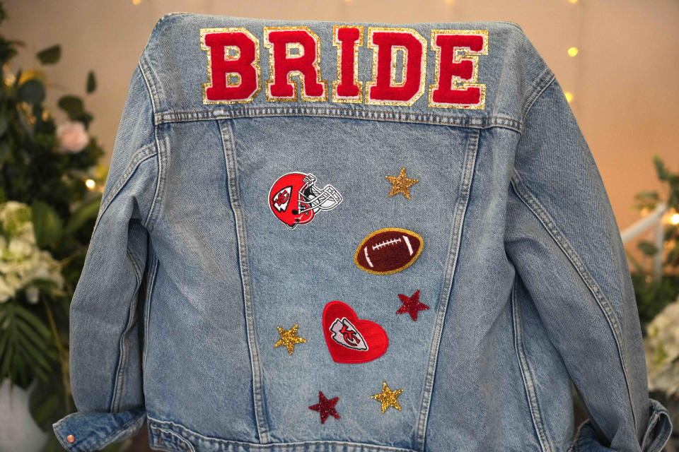 A custom jean jacket that Brooke Myers' brother made her for her Kansas City Chiefs-themed wedding.