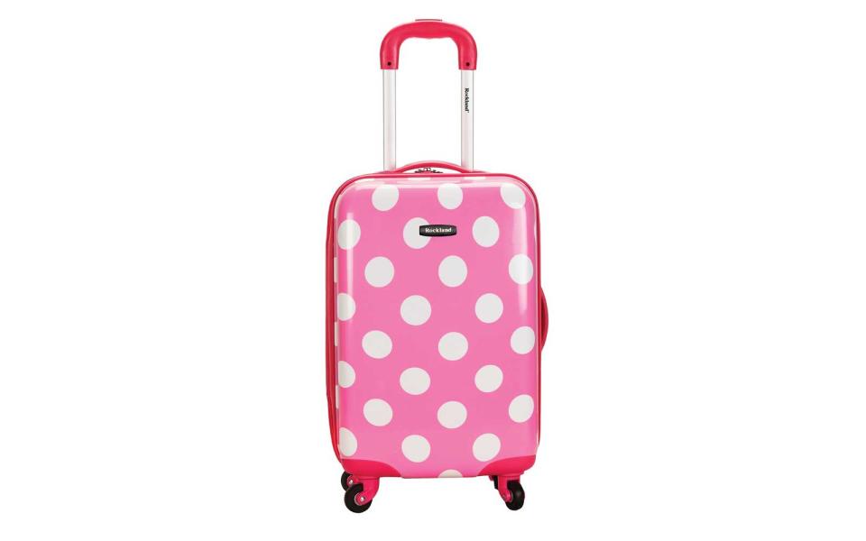 Rockland Reno Polycarbonate Carry-On in white polka dots and pink