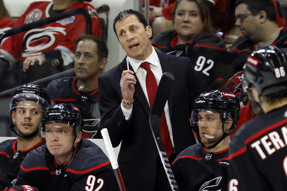 Carolina Hurricanes head coach Rod Brind'Amour talks with an official during the first period in Game 5 of an NHL hockey Stanley Cup first-round playoff series against the New York Islanders in Raleigh, N.C., Tuesday, April 30, 2024. (AP Photo/Karl B DeBlaker)