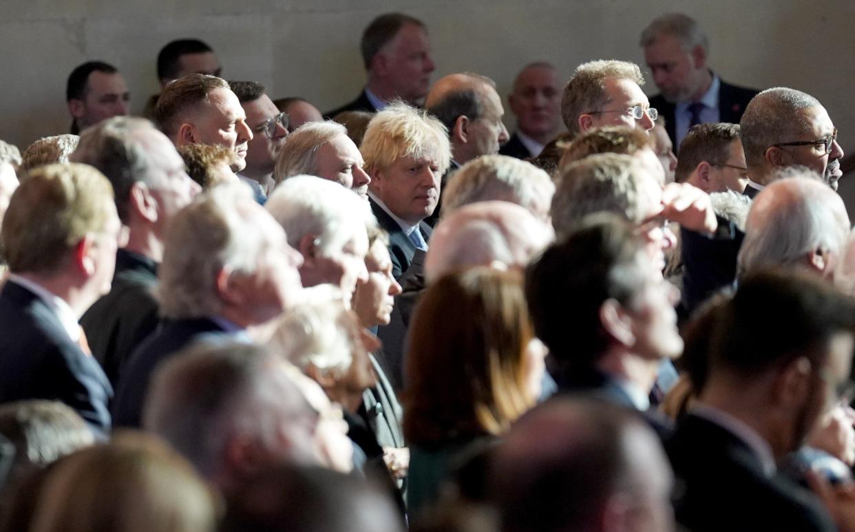 Boris Johnson listens as Volodymyr Zelensky delivers his address at Westminster Hall - Stefan Rousseau/Getty Images