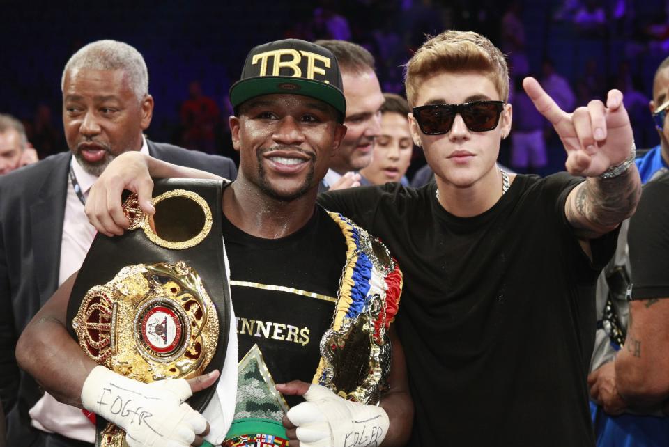 Mayweather Jr. and Bieber celebrate Mayweather's victory over WBC/WBA 154-pound champion Alvarez at the MGM Grand Garden Arena in Las Vegas, Nevada