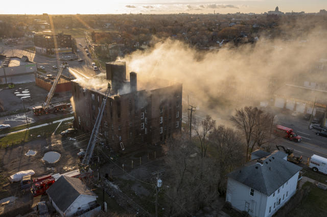 Detroit apartment fire displaces 20, man rams Eight Mile strip