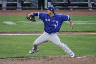 Toronto Blue Jays starting pitcher Hyun Jin Ryu throws a pitch to the Baltimore Orioles during the third inning of the first game of a baseball doubleheader, Saturday, Sept. 11, 2021, in Baltimore. (AP Photo/Julio Cortez)