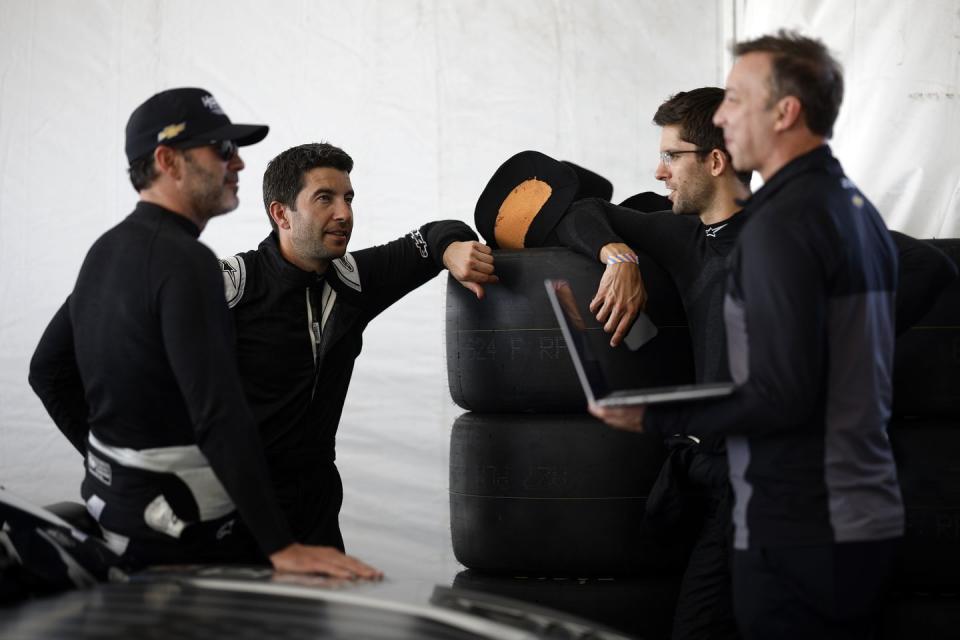 sebring, florida april 17 jimmie johnson, mike rockenfeller, jordan taylor and chad knaus talk during testing for nascar's garage 56 program at sebring international raceway on april 17, 2023 in sebring, florida photo by chris graythengetty images