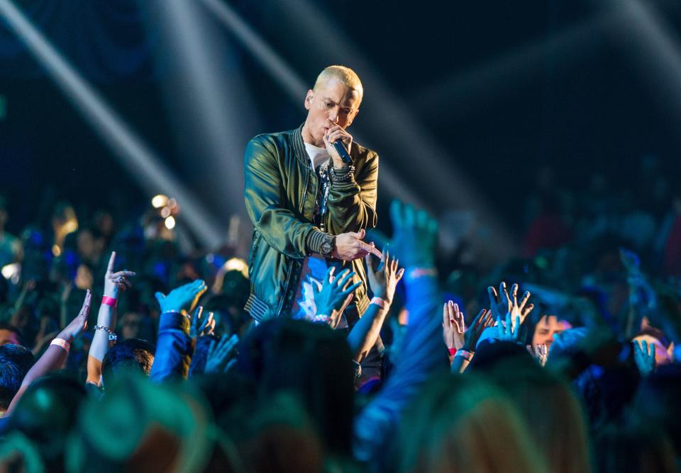 Eminem performing on stage.