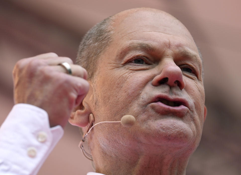 Olaf Scholz, German Finance Minister and top candidate for Chancellor, speaks at the final election campaign event of the Social Democratic Party, SPD, in Cologne, Germany, Friday, Sept. 24, 2021. The German elections will take place next Sunday, Sept. 26. (AP Photo/Martin Meissner, POOL)