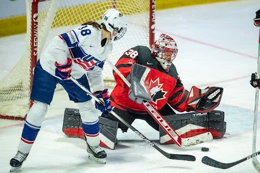 Canada goaltender Emerance Maschmeyer stops a shot from United States' Anna Wilgren during first period Rivalry Series women's hockey action in Regina on Friday.  (Liam Richards/The Canadian Press - image credit)