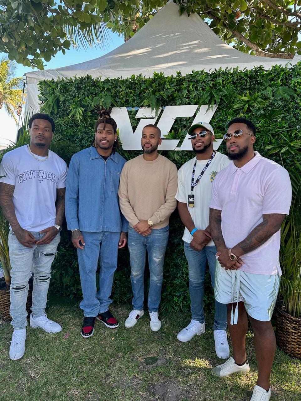 Los Angeles Chargers safety Derwin James, 
Miami Dolphins cornerback Jalen Ramsey, NFL agent David Mulugheta, Tennessee Titans safety Kevin Byard, and Jeremy Hills, founder and president of The Kollective, pose for a photo during the first National Cycling League event in Miami Beach, Florida. on April 10, 2023.