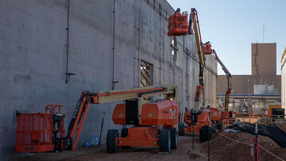 Construction equipment is used in building the new ventilation system at the Waste Isolation Pilot Plant.