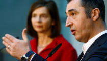 Leaders of the German Green Party Katrin Goering-Eckardt and Cem Ozdemir arrive at the Parliamentary Society for exploratory talks about forming a new coalition government in Berlin, Germany, November 15, 2017. REUTERS/Hannibal Hanschke