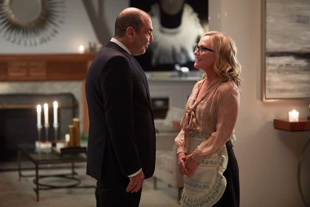 <p>Shane Mahood/USA Network/NBCU Photo Bank/NBCUniversal/Getty</p> Rick Hoffman as Louis Litt and Rachael Harris as Sheila Sazs on 'Suits' season 8.