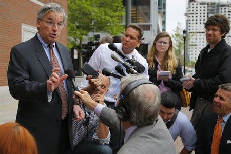 Edward Hayden (L), defense attorney for Khairullozhon Matanov talks to reporters in Boston, Massachusetts June 4, 2014. REUTERS/Brian Snyder