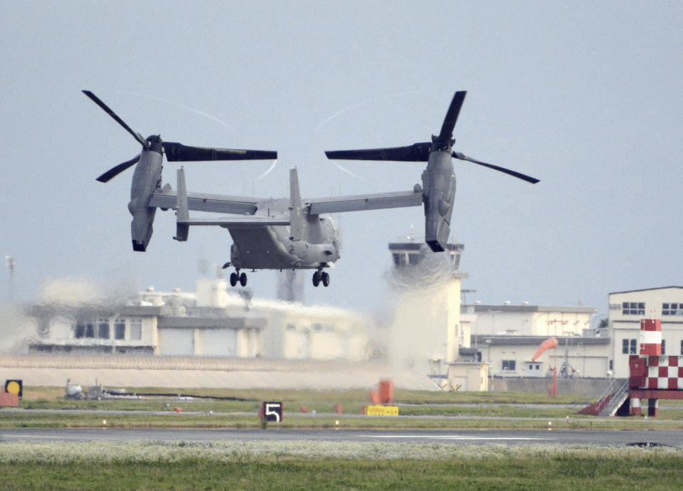 FILE - A U.S. military CV-22 Osprey takes off from Iwakuni base, Yamaguchi prefecture, western Japan, on July 4, 2018. Japanese and American military divers have spotted what could be the remains of a U.S. Air Force Osprey aircraft that crashed last week off southwestern Japan and several of the six crewmembers who are still missing, local media reported Monday, Dec. 4, 2023. (Kyodo News via AP, File)