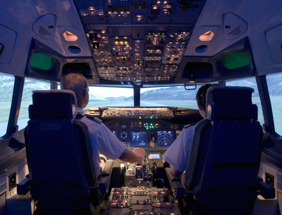 two pilots flying a plane