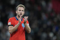 England's Harry Kane applauds after the UEFA Nations League soccer match between England and Germany at the Wembley Stadium in London, England, Monday, Sept. 26, 2022. (AP Photo/Alastair Grant)