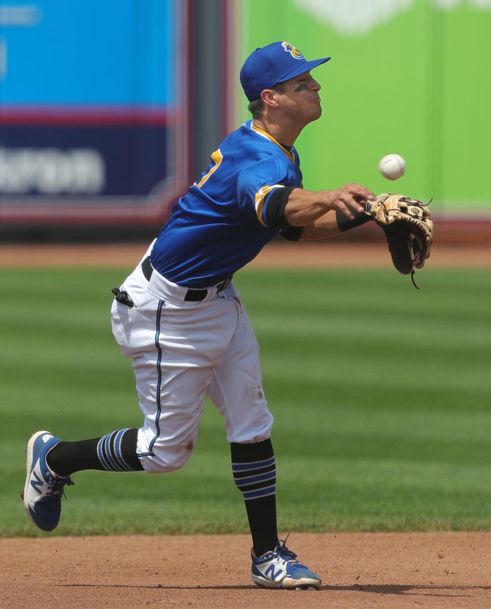 Akron RubberDucks shortstop Tyler Freeman fires a throw to first to force out Reading Fightin Phils batter McCarthy Tatum (13) during the third inning of a Minor League Baseball game at Canal Park, Sunday, May 23, 2021, in Akron, Ohio.