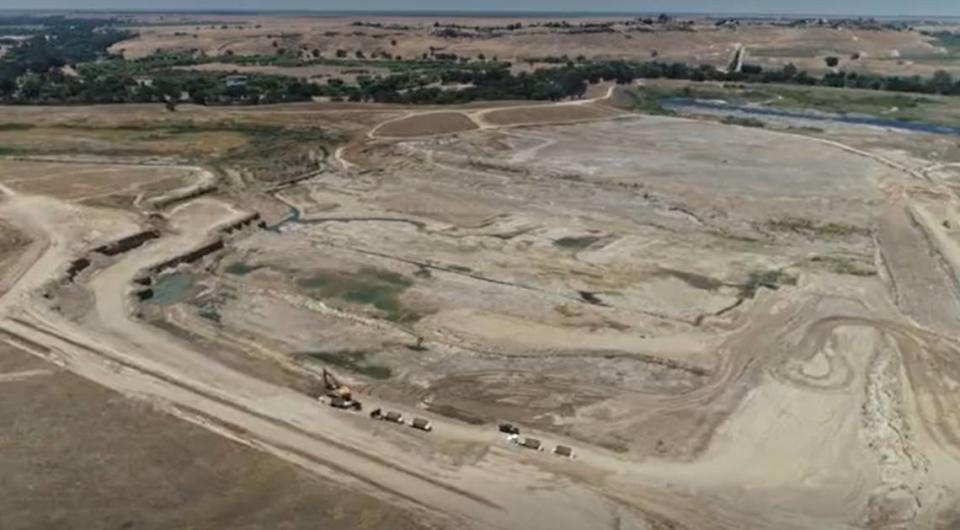 The CEMEX Rockfield Quarry site northeast of Fresno is shown in this June 2020 drone image from video looking southwest from above Friant Road toward the San Joaquin River. CEMEX is seeking a four-year extension of its sand- and gravel-mining operations through mid-2027.