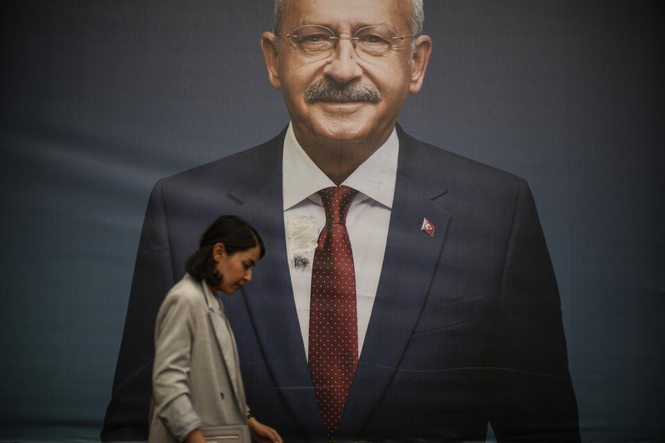 A woman walks past a billboard of Turkish CHP party leader Kemal Kilicdaroglu a day after the presidential election day in Istanbul, Turkey, Monday, May 29, 2023. Turkish President Recep Tayyip Erdogan has dissipated a challenge by an opponent who sought to reverse his increasingly authoritarian leanings, securing five more years to oversee the country at the crossroads of Europe and Asia that plays a key role in NATO. (AP Photo/Emrah Gurel)