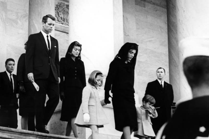 The Kennedy family departs the Capitol on November 25, 1963. From left to right are Peter Lawford, Attorney General Robert Kennedy, Patricia Kennedy Lawford, Caroline Kennedy, First Lady Jacqueline Kennedy, and John F. Kennedy Jr. Photo by Abbie Rowe/John F. Kennedy Presidential Library &amp Museum