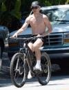 <p>A solo Shaun White takes his bike for a spin in Los Angeles on Tuesday.</p>