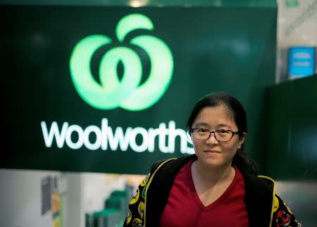 Chinese "daigou" shopping agent Na Wang leaves an Australian supermarket chain store, where she procured Australian goods for Chinese customers, in Sydney, Australia August 2, 2016. Picture taken August 2, 2016. REUTERS/Jason Reed