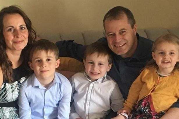 Deirdre Morley, 43, and Andrew McGinley with their three children, nine-year-old Conor (second left), seven-year-old Darragh (centre) and three-year-old Carla (far right): PA