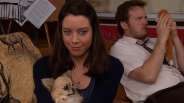 April holding a dog with Andy in "Parks and Recreation"