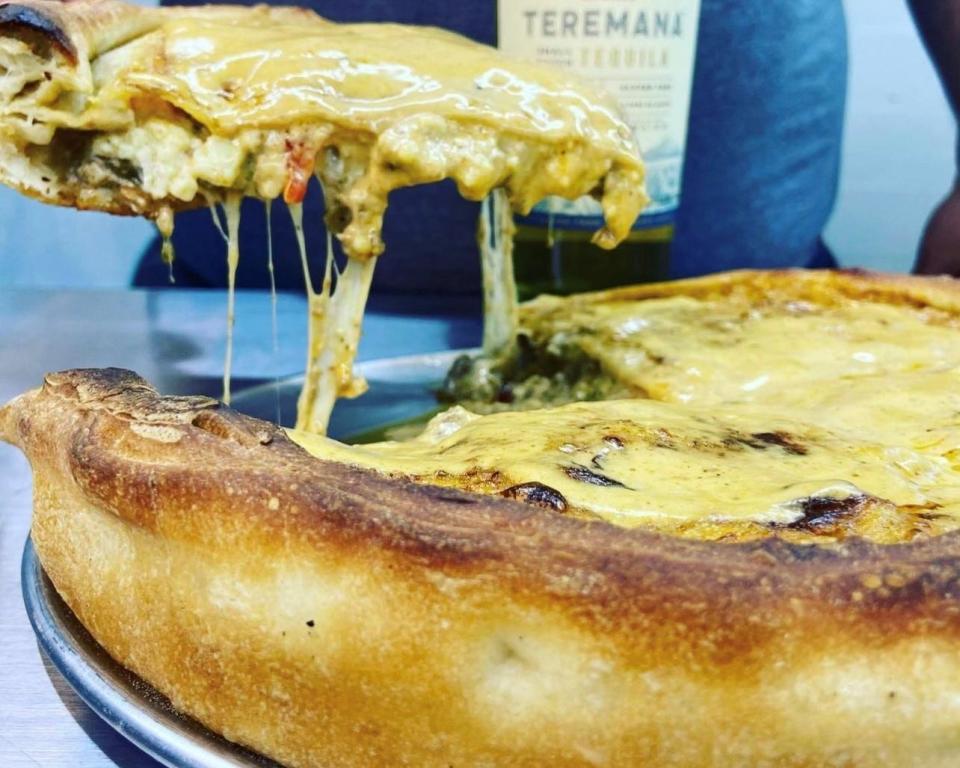 Chicago stuffed deep dish cheesesteak pizza with Chipotle crema made with Teremana Tequila from Sam's Coal Fired Pizza.