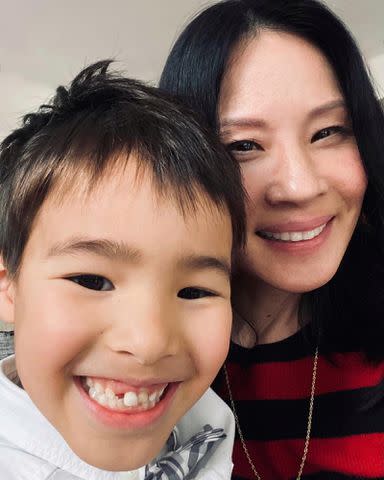 <p>Lucy Liu Instagram</p> Lucy Liu and her son Rockwell Lloyd Liu take a selfie.